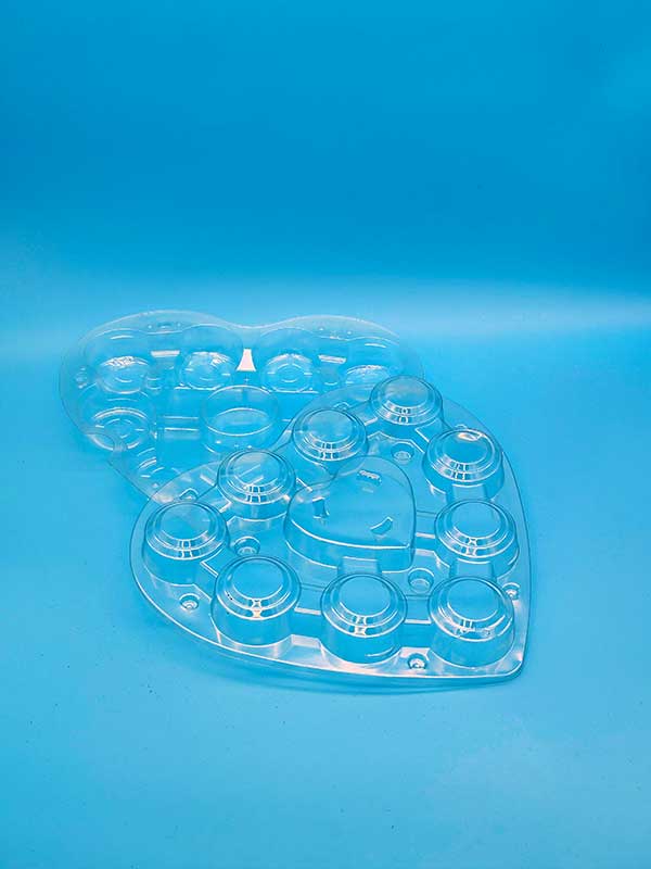 Boden und Deckel der wiederverschließbaren Herzverpackung für Schwedenbomben